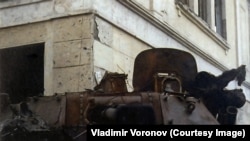 A Russian armored vehicle "684" with the remains of a soldier