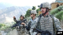 U.S. soldiers patrol a mountain pass in the eastern Afghan province of Kunar.