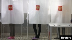 Russian voters cast ballots in the March presidential election.