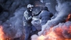 В разгар столкновений в центре Киева, февраль 2014 года 