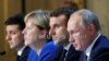 Paris, 9 decembrie 2019: summitul „formatului Normandia” pentru reglementarea conflictului din estul Ucrainei: cancelara germană Angela Merkel și președinții Ucrainei, Franței și Rusiei, Vlodimir Zelenski, Emmanuel Macron și Vladimir Putin. 