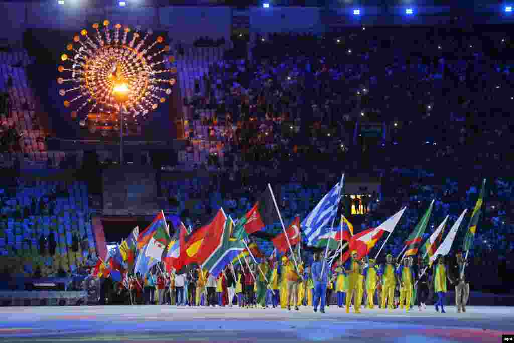 Athletes enter the Maracana Stadium during the closing ceremony of the Olympic Games on August 21.&nbsp;