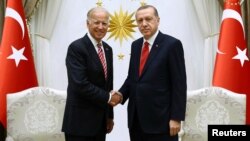 Turkish President Recep Tayyip Erdogan (right) meeting with Joe Biden, then U.S. vice president, in Ankara in August 2016