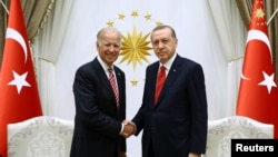 Turkish President Recep Tayyip Erdogan (right) meets with Joe Biden, then U.S. vice president, in Ankara in August 2016