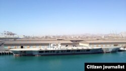 Iran Revolutionary Guard made a smaller mock American aircraft carrier and sank it in 2015. FILE Photo, February 25, 2015.