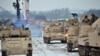 Echipamentul militar de luptă al Brigăzii blindate a 3-a din SUA, Divizia a 4-a de infanterie este descărcat în tabăra Drawsko Pomorskie, Polonia, 10 ianuarie 2017