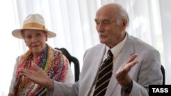 Prince Dimitry Romanovich Romanov of the House of Romanov and his wife, Dorrit Reventlow, talk to reporters at the airport in Simferopol, Crimea, in August 2015.