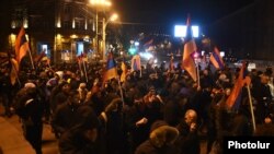 Opposition supporters rally against the results of the constitutional referendum in Yerevan on December 7.