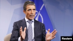 Belgium -- NATO Secretary-General Anders Fogh Rasmussen speaks during an interview with Reuters at the Alliance headquarters in Brussels, 03Sep2012