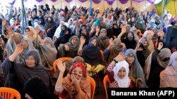 Members of the Shia Hazara minority sit-in during a protest in Quetta on April 15.