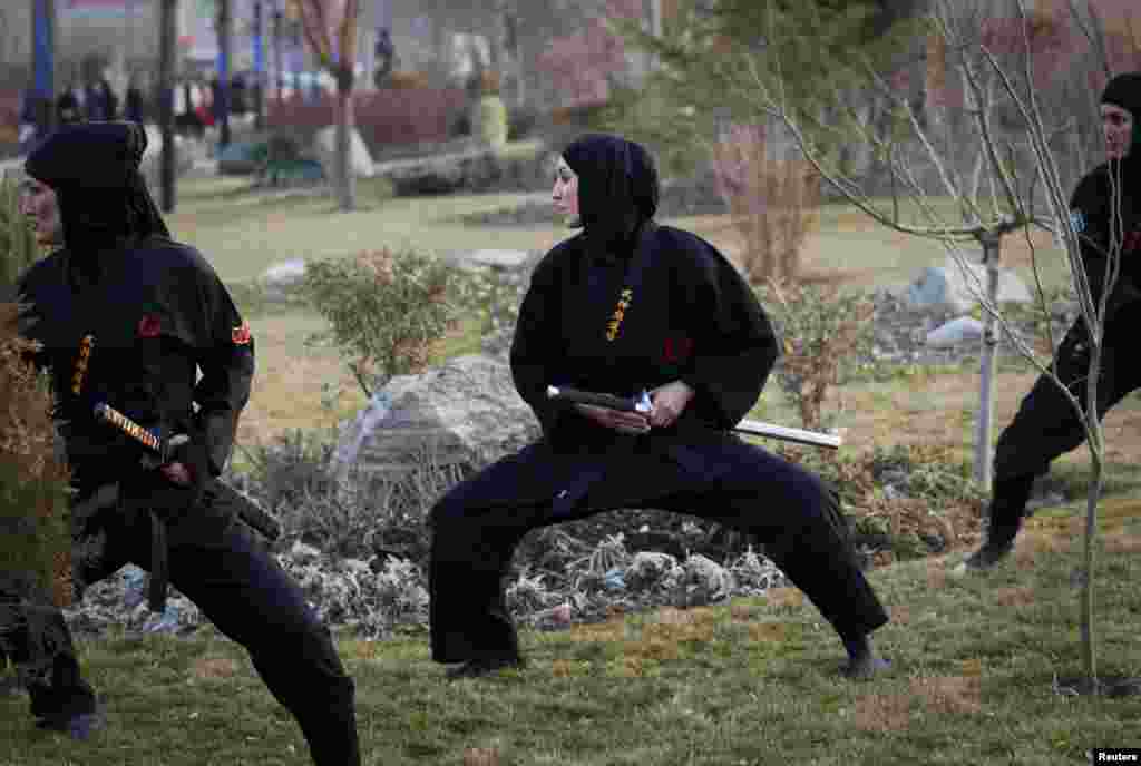 Members participate in a sword drill.