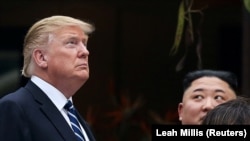 Donald Trump și Kim Jong Un la hotelul Metropole din Hanoi, în cea de-a doua zi a summitului, 28 februarie 2019