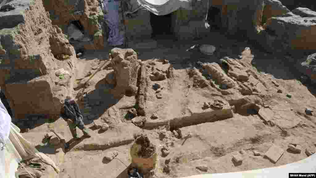 An archaeologist walks at the monastery site at Mes Aynak in Afghanistan.