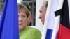 Меркель и Путин во время встречи 18 августа 2018 года близ Берлина