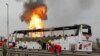 Firefighers are seen at the scene of the gas pipeline explosion in the Southwestern province of Khuzestan, March 14, 2019