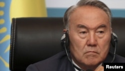 Kazakh President Nursultan Nazarbaev, "leader of the nation," budding personality cult.