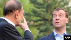 "How 'bout this weather?" Russian President Dmitry Medvedev (right) with EU foreign policy chief Javier Solana prior to an EU-Russia summit in May 2009