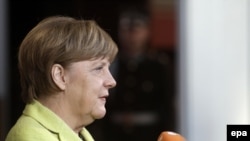 Latvia -- German Chancellor Angela Merkel before a working dinner for the Heads of Delegation on the occasion of the Eastern Partnership Summit hosted by the President of Latvia in Blackheads' House, Riga, May 21, 2015