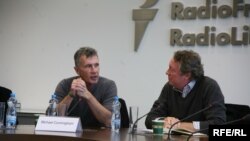 Michael Cunningham (left) discussing "By Nightfall'' at RFE in Prague.