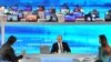 Президент России Владимир Путин во время "прямой линии" в эфире государственных телеканалов. Москва, 16 апреля 2015 года