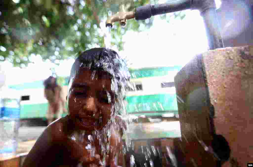 A Karachi boy cools off.