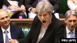 Premierul britanic Theresa May în Parlament, Londra, 21 martie 2018