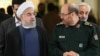 حسن روحانی (سمت چپ) با حسین دهقان، وزیر دفاع ایران.