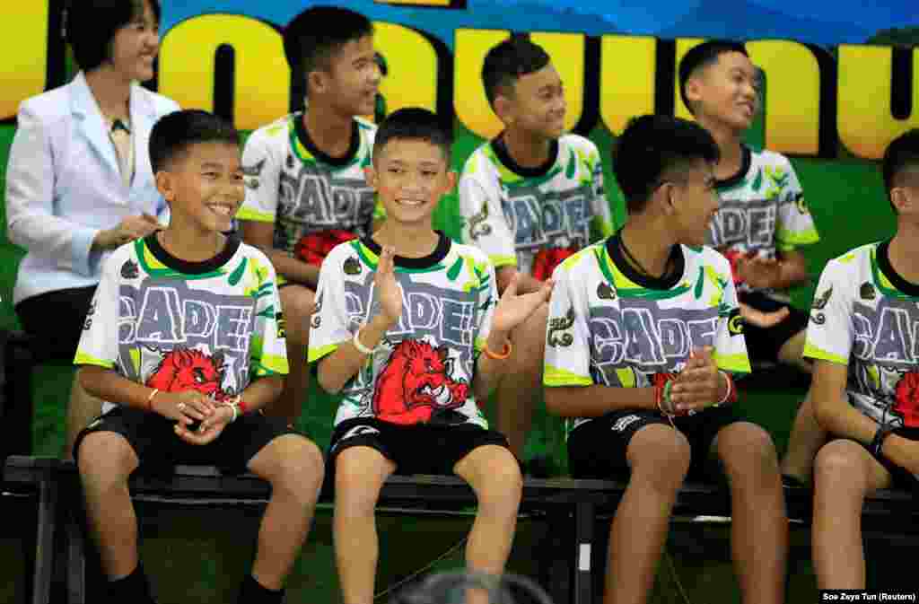 The 12 members of the Wild Boars soccer team and their coach talk about their experience of being trapped in a flooded cave for 18 days during a news conference in Chiang Rai, Thailand. The boys had no food and survived only on water. A diver died in the attempt to rescue the boys.(Reuters/Soe Zeya Tun)