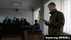 Прокурор Станислав Фрунзе зачитывает ходатайство о продлении ареста Тараса Сынычаку
