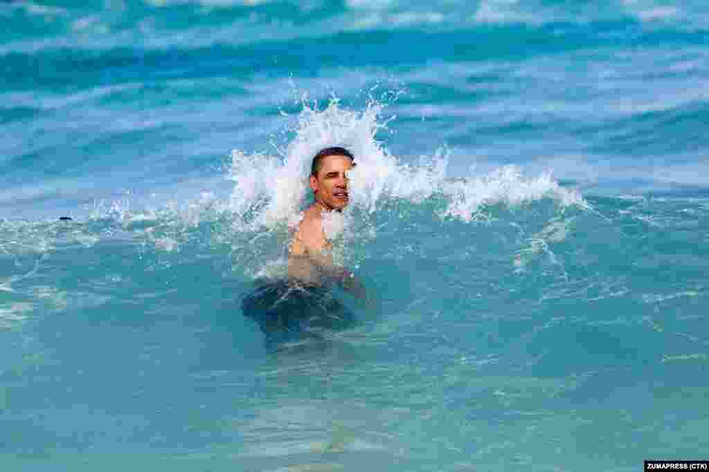 Obama swims in Kaneohe Bay, Hawaii, on January 1, 2012. He is the first U.S. president born in Hawaii and the first born outside the 48 contiguous states.&nbsp;