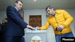 Nagorno-Karabakh - A man casts a ballot at a polling station in Stepanakert, 20Feb2017.