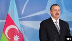 Belgium -- President of Azerbaijan, Ilham Aliyev, addresses the media prior to a North Atlantic Council (NAC) meeting at the NATO headquarters in Brussels, January 15, 2013