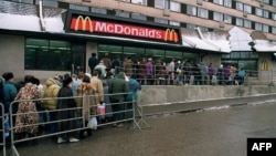 Muscovites queue in front of a McDonald's restaurant in Moscow in February 1992.