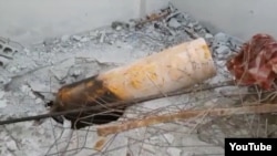 Предположительно, химический боеприпас, сброшенный на город Дума