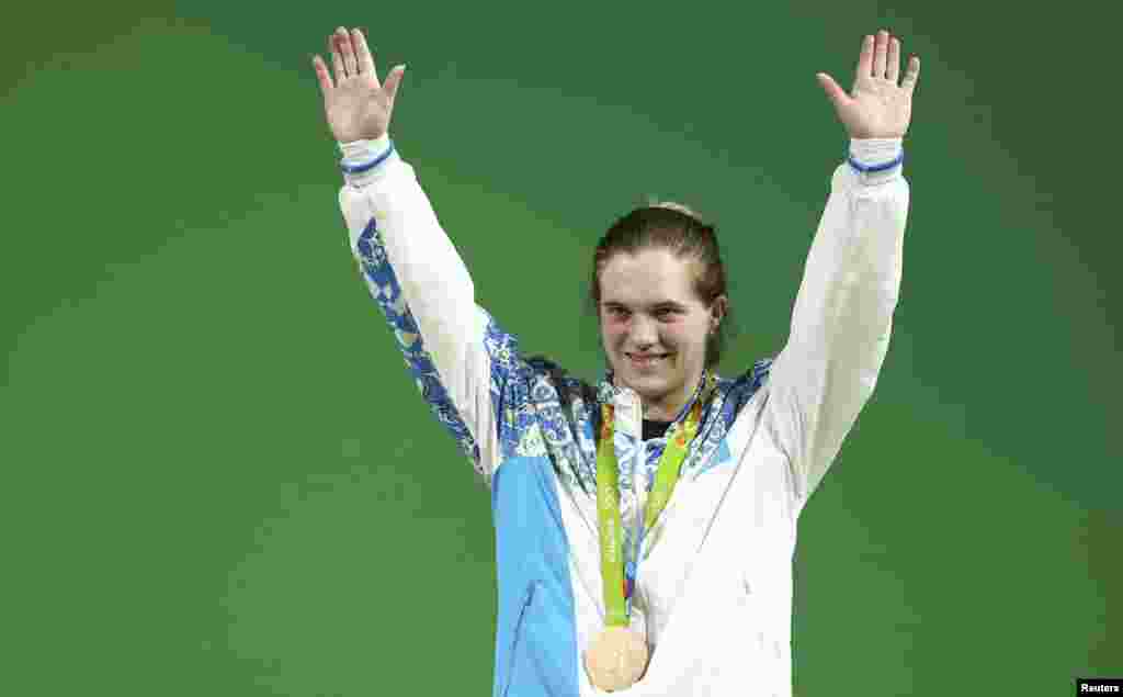 Ауыр атлет Карина Горичева әйелдер арасындағы 63 килограмм салмақ дәрежесінде қола жүлде алды. Ол олимпиада чемпионы қытайлық Дэнг Вэйден 19 килограмм аз көтерді.&nbsp;
