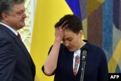 Petro Porosenko si Nadia Savcenko, la eliberare, in luna mai.