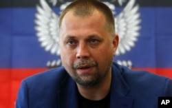 Aleksandr Borodai speaks at a news conference in Donetsk in June 2014.