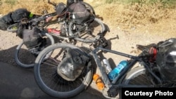 TAJIKISTAN -- the bicycles of tourists are seen in the place of attack in South Tajikistan, where four foreign cyclists were killed, Dangara district, July 29, 2018