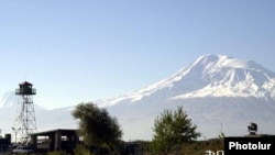 Armenia -- A border-guard watchtower on the Armenian-Turkish frontier pictured against the backdrop of Mount Ararat.