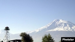 Armenia -- A border-guard watchtower on the Armenian-Turkish frontier pictured against the backdrop of Mount Ararat.