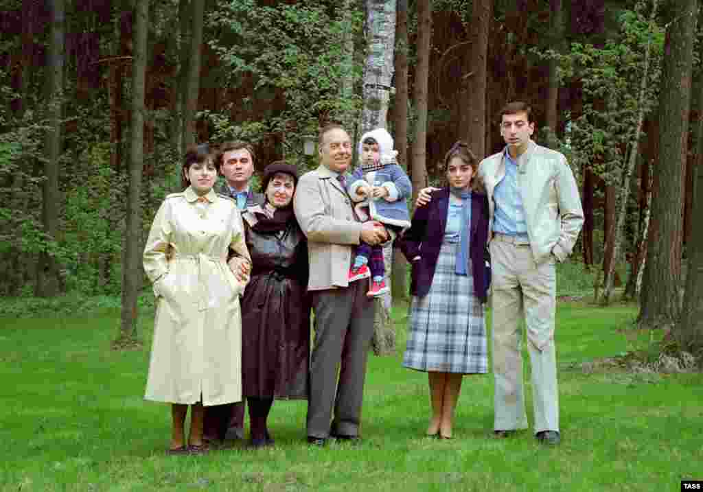 Aliyev family portrait: former President Heydar Aliyev (center), surrounded (left to right) by his daughter, Sevil; son-in-law; wife Zarifa; granddaughter; and his son, current President Ilham Aliyev with his future wife, Mehriban. 