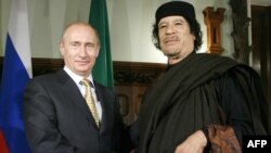 Russian Prime Minister Vladimir Putin (left) welcomed Libyan leader Muammar Qaddafi on his visit to Moscow in November 2008.