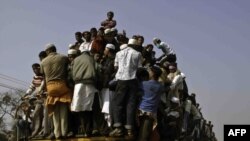 Muslim devotees crowd together in an effort to see the closing prayers of the Bishwa Itjema in Tongi, near Dhaka, Bangladesh, on January 24.