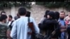 Скриншот с видеозаписи в YouTube, где говорится о казахских боевиках в Сирии. 