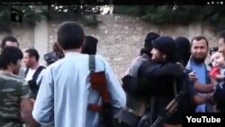 Скриншот с видеозаписи в социальных сетях "150 казахов, прибывших на джихад в Сирию".