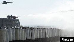 Armenia - Riot police practice practice crowd dispersal at the Arzni airfield, 13Sep2014.