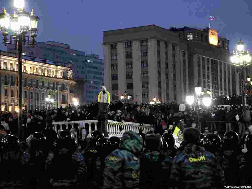 Riot police confront soccer fans demonstrating on Moscow's Manezh Square on December 11 in memory of a fellow fan killed the week before. Thousands of ultranationalists and soccer hooligans chanted racist slogans and attacked non-Slavic bystanders in the worst outbreak of racially motivated rioting in the Russian capital since the 1991 Soviet collapse.Photo by Yuri Timofeyev for RFE/RL