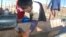 Kyrgyzstan – Kyrgyz children, water, Kara-Kabak village, Osh oblast, 16Aug2011