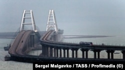 This archival photo, taken from a viewpoint above the city of Kerch, shows the Crimea Bridge (aka the Kerch Bridge) as it appeared in December 2019.<br>