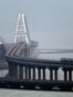This archival photo, taken from a viewpoint above the city of Kerch, shows the Crimea Bridge (aka the Kerch Bridge) as it appeared in December 2019.<br>